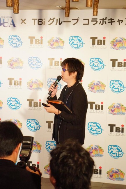 発表会の様子。壇上はスパイシーソフト株式会社執行役員の村山章。 発表会の様子。壇上はスパイシーソフト株式会社執行役員の村山章。